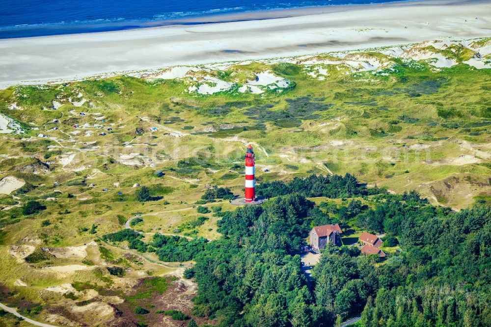 Aerial image Nebel - Lighthouse as a historic seafaring character Amrum in Nebel auf Amrum in the state Schleswig-Holstein, Germany