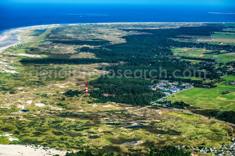 Nebel from above - Lighthouse as a historic seafaring character Amrum in Nebel auf Amrum in the state Schleswig-Holstein, Germany