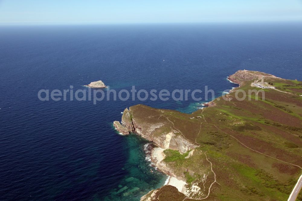 Plevenon from the bird's eye view: Lighthouse as a seafaring character in the coastal area of the district Cap Frehel in Plevenon in Brittany, France