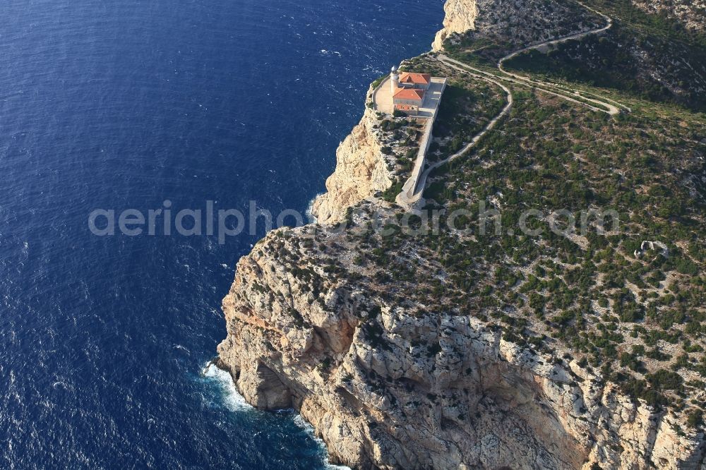 Andratx from the bird's eye view: Lighthouse on the rocky cliffs of the Badia de Pollenca on the Mediterranean island Sa Dragonera an natural park in Andratx in Mallorca in Balearic Islands, Spain