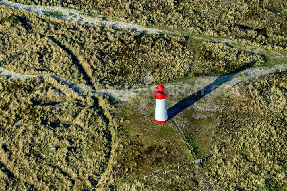 List from above - Lighthouse as a historic seafaring character in the coastal area List-West in List at the island Sylt in the state Schleswig-Holstein, Germany