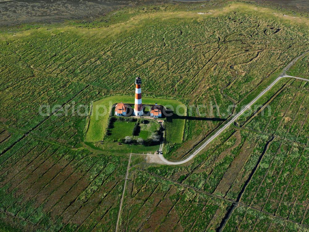 Westerhever from above - The lighthouse Westerheversand is situated on a mound prior Westerhever place. The lighthouse is the most famous landmark of the peninsula Eiderstedt in Schleswig-Holstein