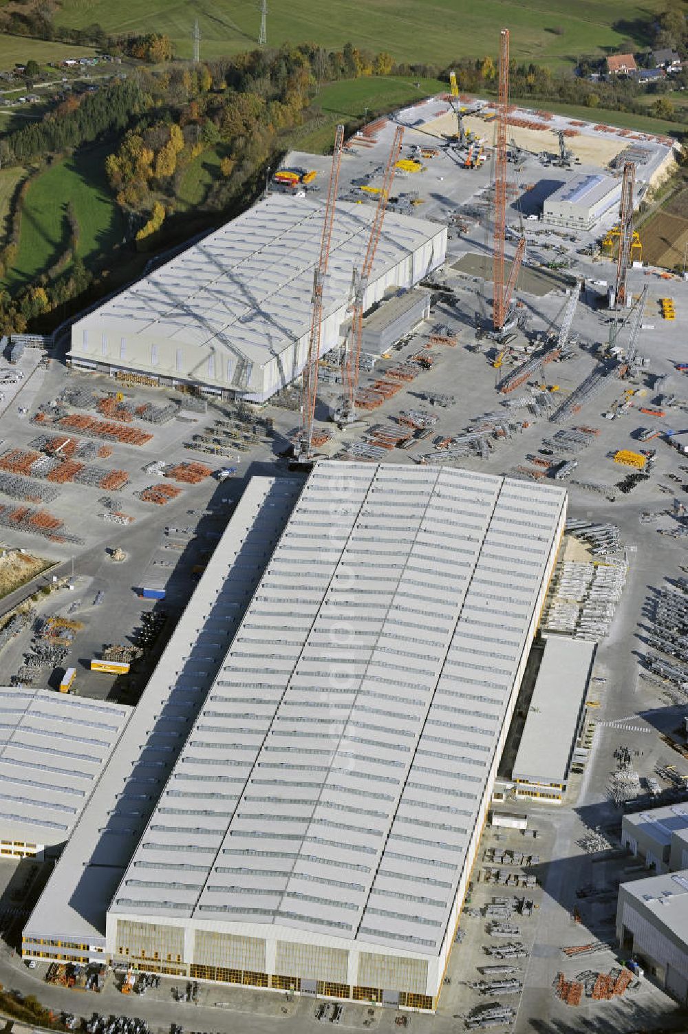 Aerial photograph Ehingen - Blick auf das Gelände der Liebherr-Werk Ehingen GmbH. Die Tochter der Liebherr-International AG gehört zu den weltweit führenden Herstellern von Fahrzeugkranen. Momentan wird das Gelände erweitert. View of the site of the Liebherr-Werk GmbH Ehingen.