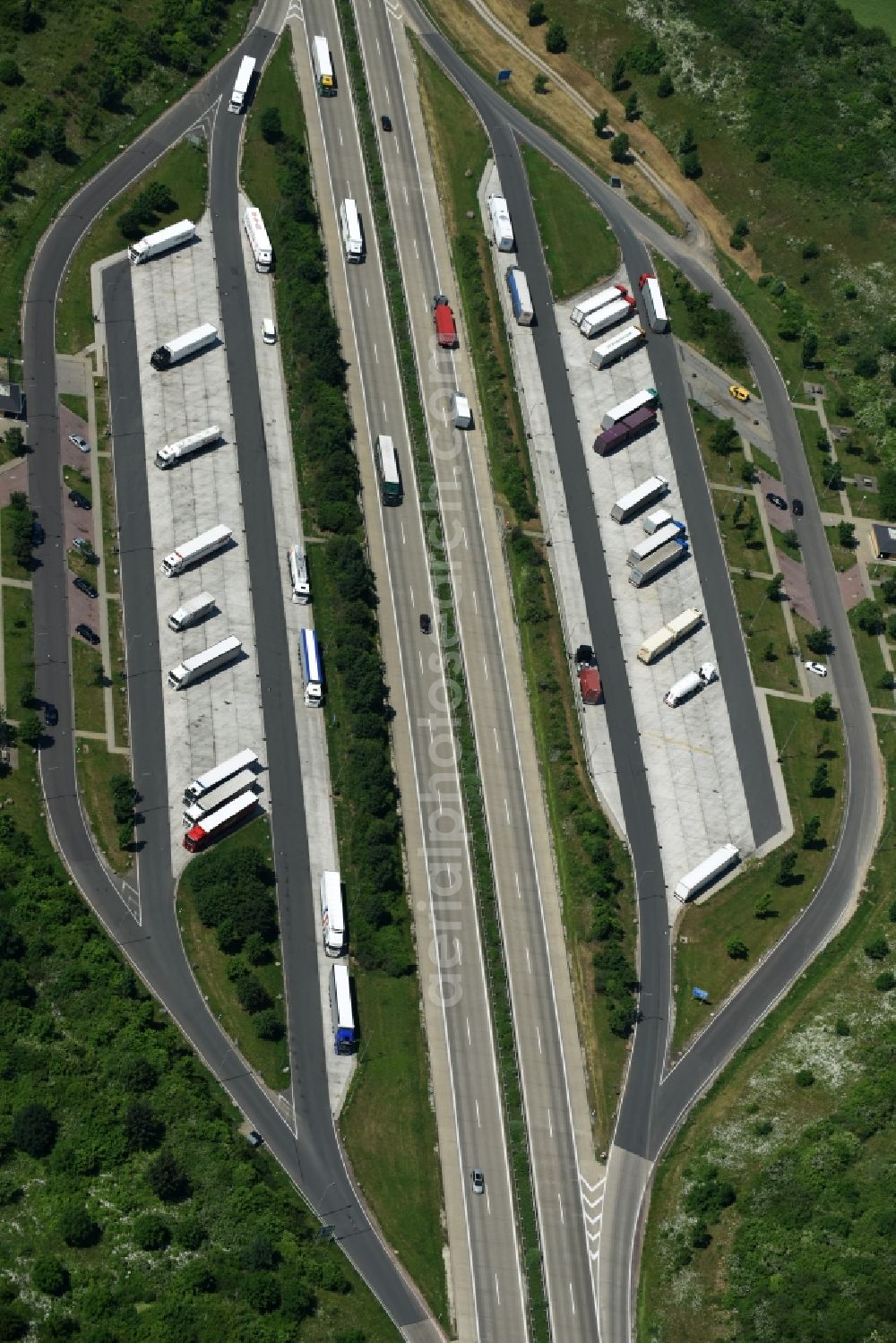 Aerial image Bördeland - Lorries - parking spaces at the highway parking of the BAB A 14 in Boerdeland in the state Saxony-Anhalt