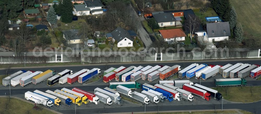 Michendorf from the bird's eye view: Lorries - parking spaces at the highway rest stop and parking of the BAB A 10 Berliner Ring in Michendorf in the state Brandenburg