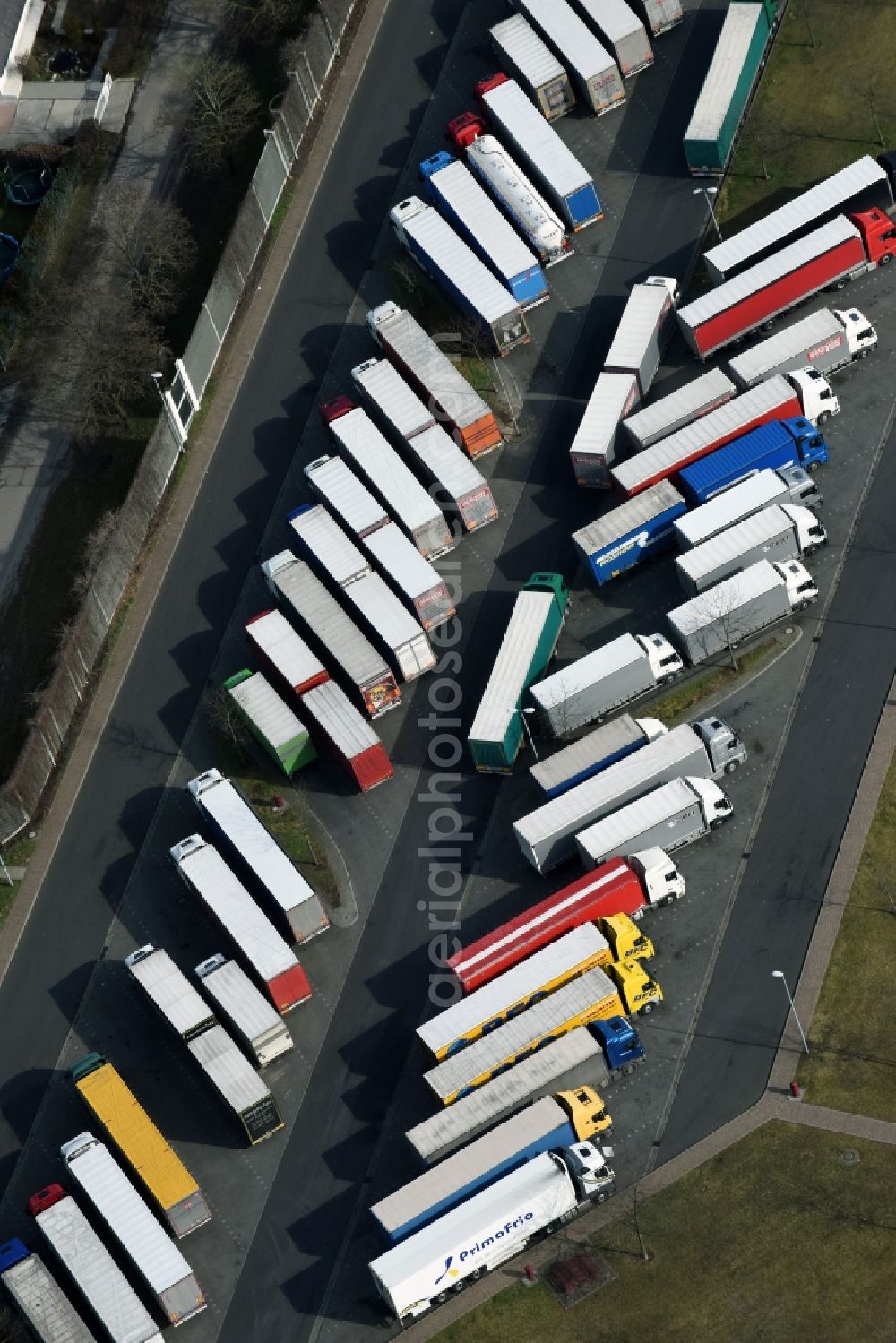 Aerial photograph Michendorf - Lorries - parking spaces at the highway rest stop and parking of the BAB A 10 Berliner Ring in Michendorf in the state Brandenburg