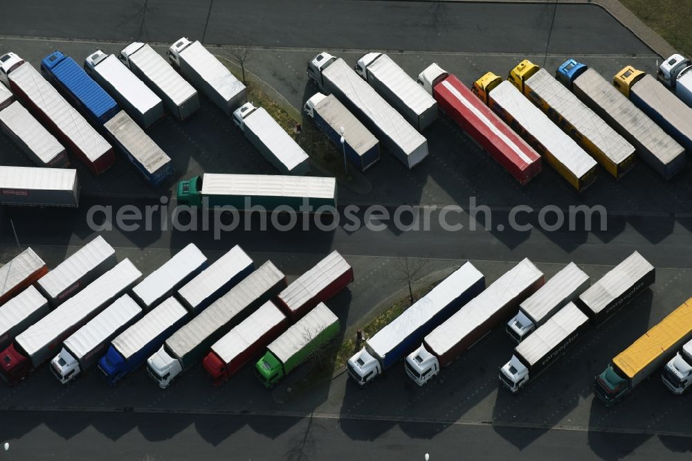 Aerial photograph Michendorf - Lorries - parking spaces at the highway rest stop and parking of the BAB A 10 Berliner Ring in Michendorf in the state Brandenburg