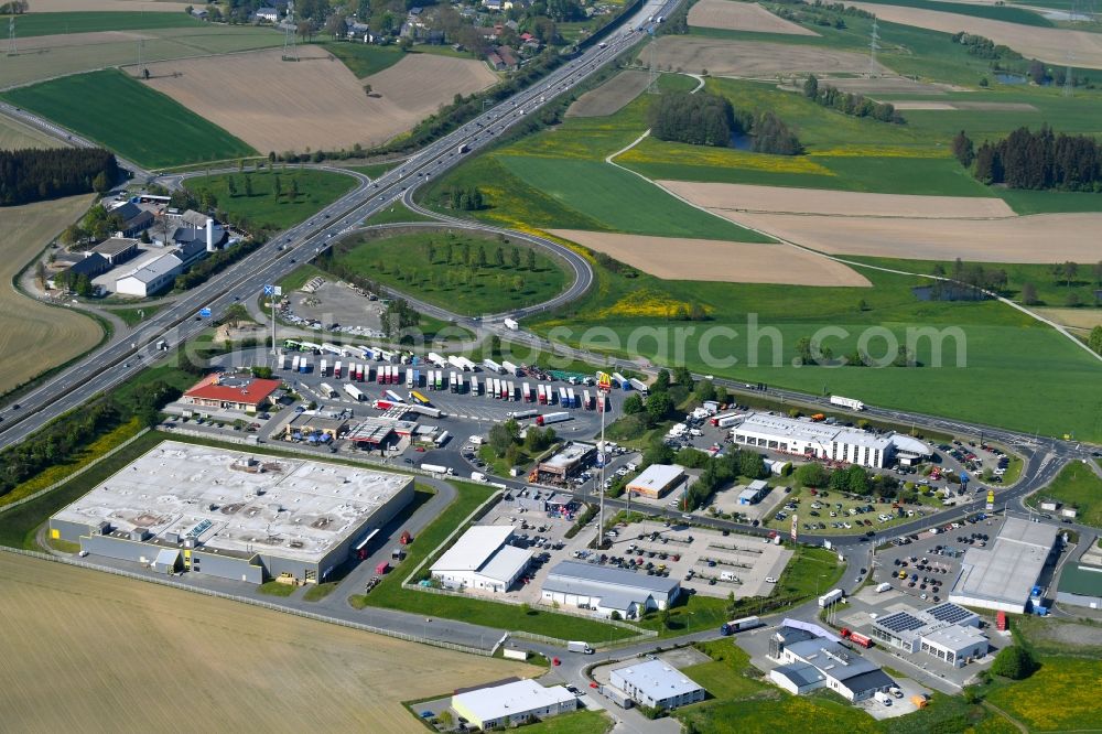 Münchberg from above - Lorries - parking spaces at the highway rest stop and parking of the BAB A 9 on Euro Rastpark Muenchberg-Nord in Muenchberg in the state Bavaria, Germany