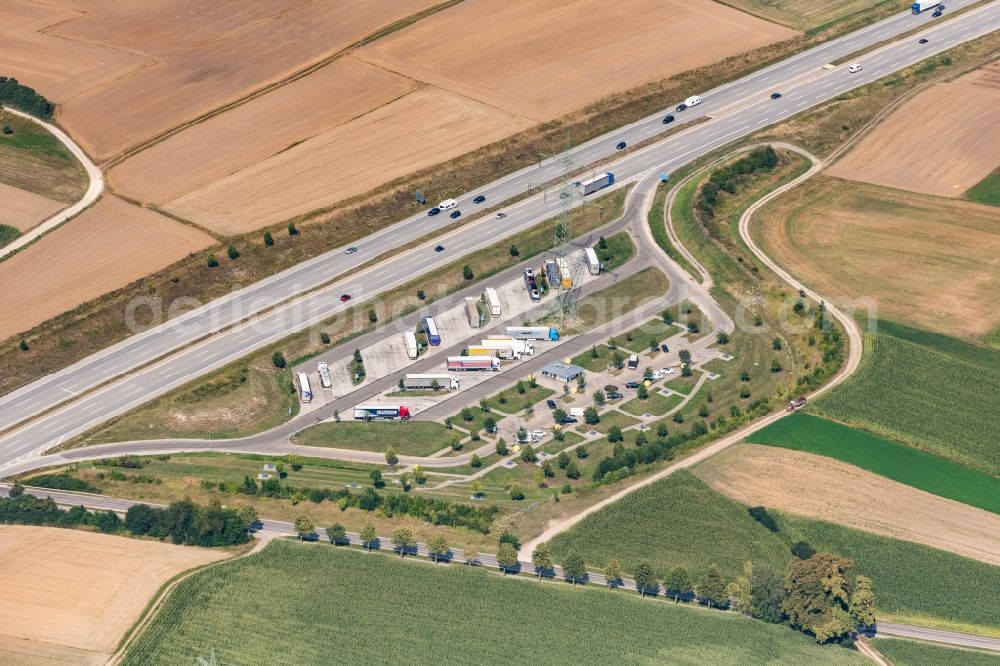 Friedberg from the bird's eye view: Lorries - parking spaces at the highway rest stop and parking of the BAB A 8 Parkplatz Kirchholz Sued in Friedberg in the state Bavaria, Germany