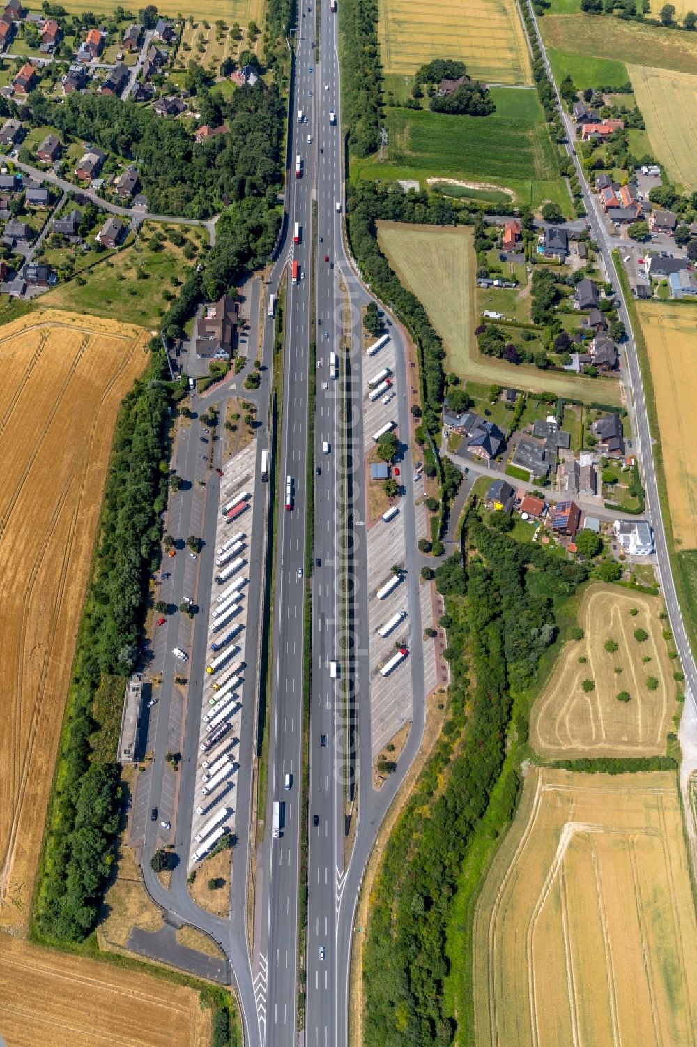 Aerial image Vellern - Lorries - parking spaces at the highway rest stop and parking of the BAB A 2 in Vellern in the state North Rhine-Westphalia, Germany