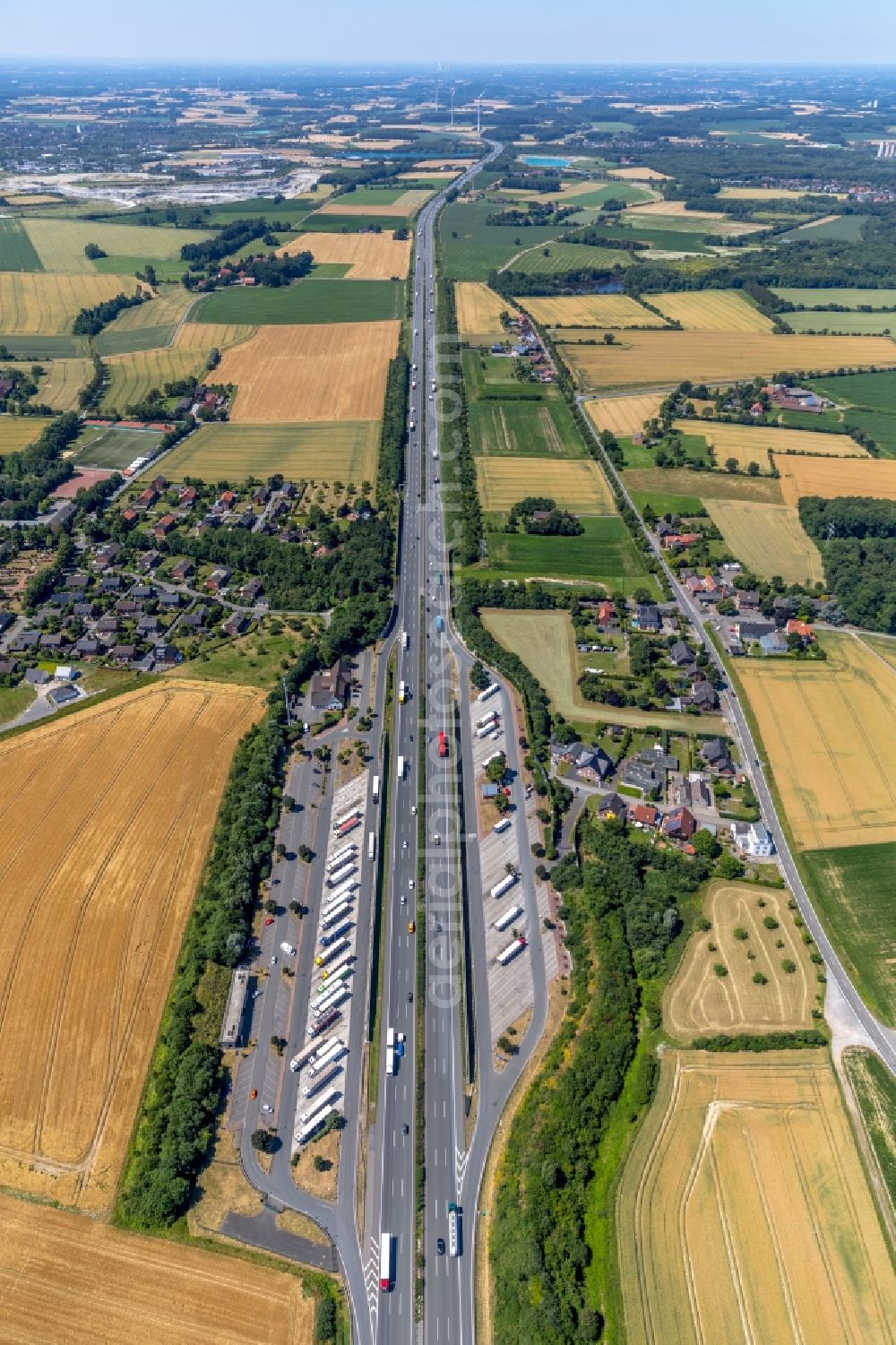 Vellern from above - Lorries - parking spaces at the highway rest stop and parking of the BAB A 2 in Vellern in the state North Rhine-Westphalia, Germany