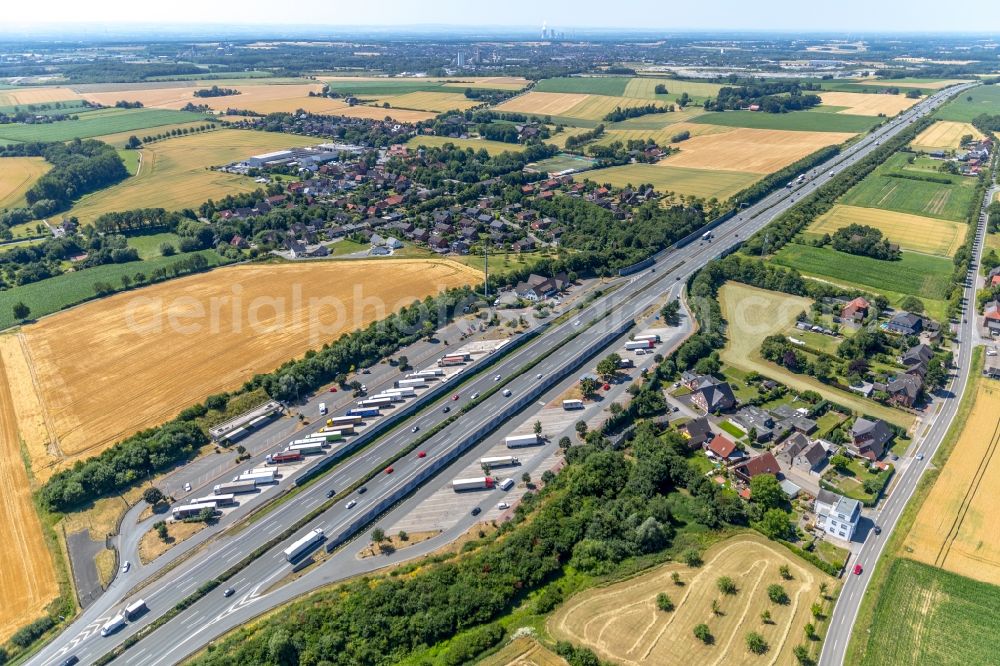 Aerial photograph Vellern - Lorries - parking spaces at the highway rest stop and parking of the BAB A 2 in Vellern in the state North Rhine-Westphalia, Germany