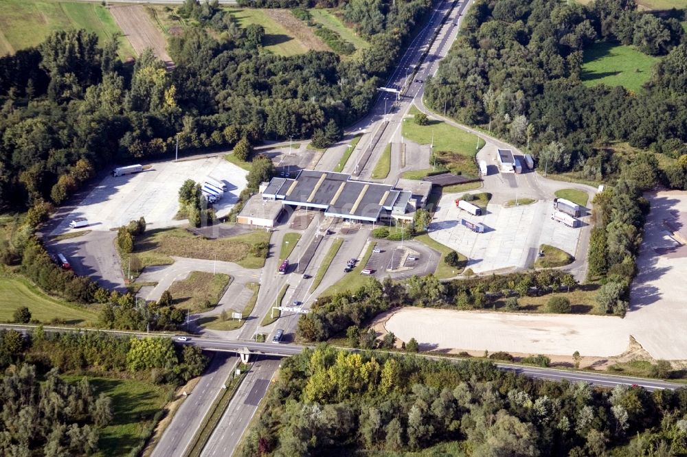 Scheibenhard from above - Lorries and Truck storage areas and free-standing storage on former customs Lauterbourg now state-police department Bienwald in Scheibenhard in Grand Est, France