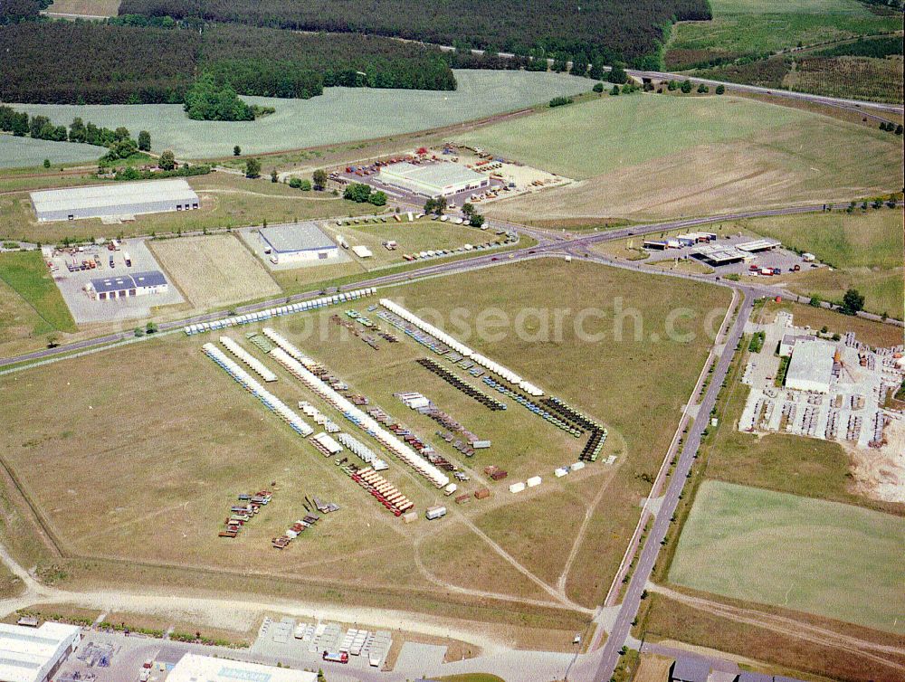 Aerial photograph Liebenthal - GDR truck of the brand IFA W50 - L60 - as an unsellable new production in storage areas and open space warehouses of Thiele KG on the street MEGA-Allee in Liebenthal in the state Brandenburg, Germany