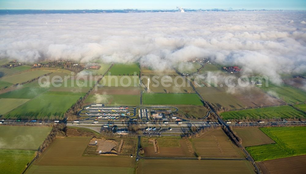 Büderich from above - Lorries - parking spaces at the highway rest stop and parking of the BAB A44 Serways Raststaette Am Haarstrang in Buederich at Ruhrgebiet in the state North Rhine-Westphalia, Germany