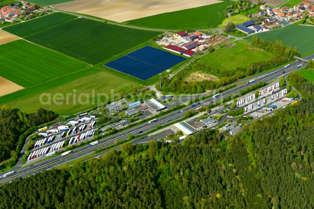 Kleinlangheim from above - Lorries - parking spaces at the highway rest stop and parking of the BAB A 3, Serways Raststaette Haidt Sued in Kleinlangheim in the state Bavaria, Germany