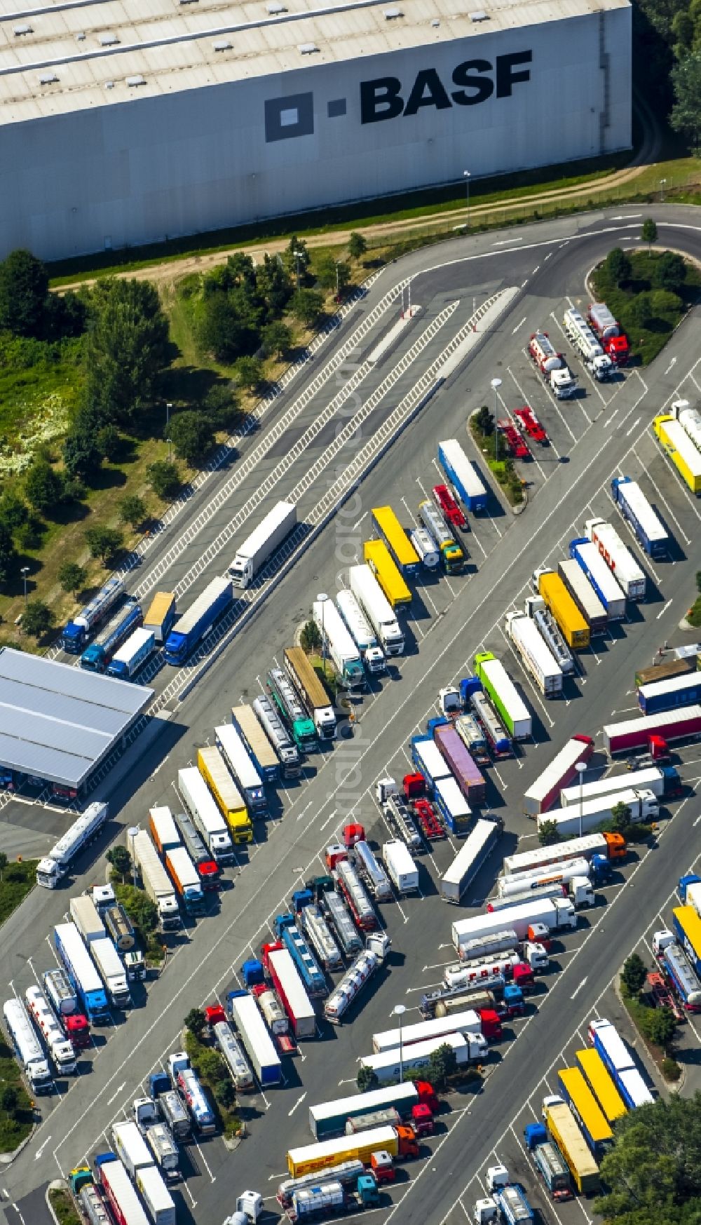 Ludwigshafen am Rhein from the bird's eye view: Truck car park and parking area on the premises of BASF AG in Ludwigshafen am Rhein in Rhineland-Palatinate