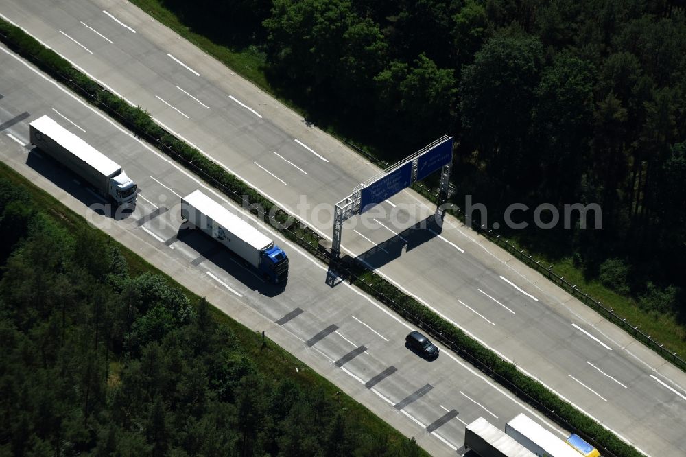 Aerial image Nahmitz - Lorries freight by road along the Highway BAB A2 in Nahmitz in the state Brandenburg