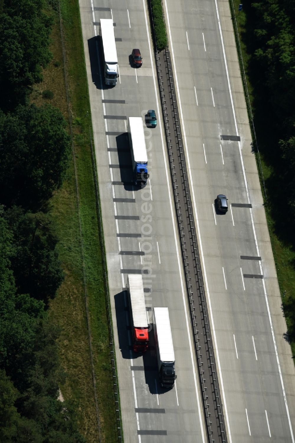 Aerial image Nahmitz - Lorries freight by road along the Highway BAB A2 in Nahmitz in the state Brandenburg