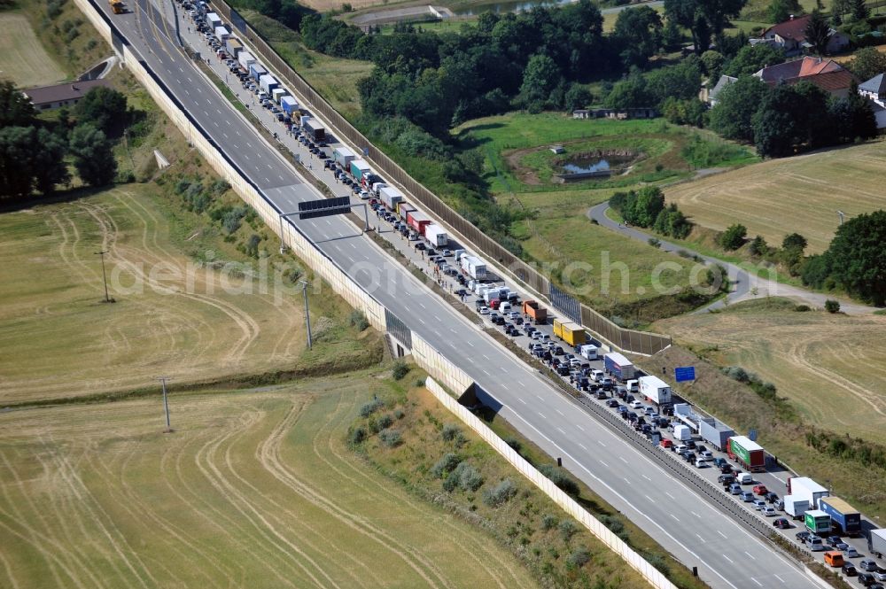 Aerial image Triptis - Buildings and route of the motorway A9 motorway with four lanes now. Currently, reconstruction, expansion and new construction work is underway for the six-lane expansion of Highway 9 between Triptis and Schleiz by Wayss & Freytag Ingenieurbau and EUROVIA VINCI in Thuringia