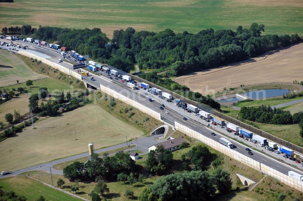 Aerial image Triptis - Buildings and route of the motorway A9 motorway with four lanes now. Currently, reconstruction, expansion and new construction work is underway for the six-lane expansion of Highway 9 between Triptis and Schleiz by Wayss & Freytag Ingenieurbau and EUROVIA VINCI in Thuringia