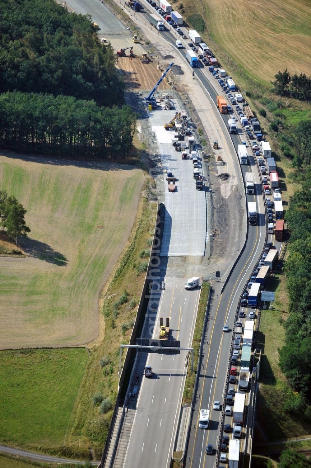 Aerial image Triptis - Buildings and route of the motorway A9 motorway with four lanes now. Currently, reconstruction, expansion and new construction work is underway for the six-lane expansion of Highway 9 between Triptis and Schleiz by Wayss & Freytag Ingenieurbau and EUROVIA VINCI in Thuringia