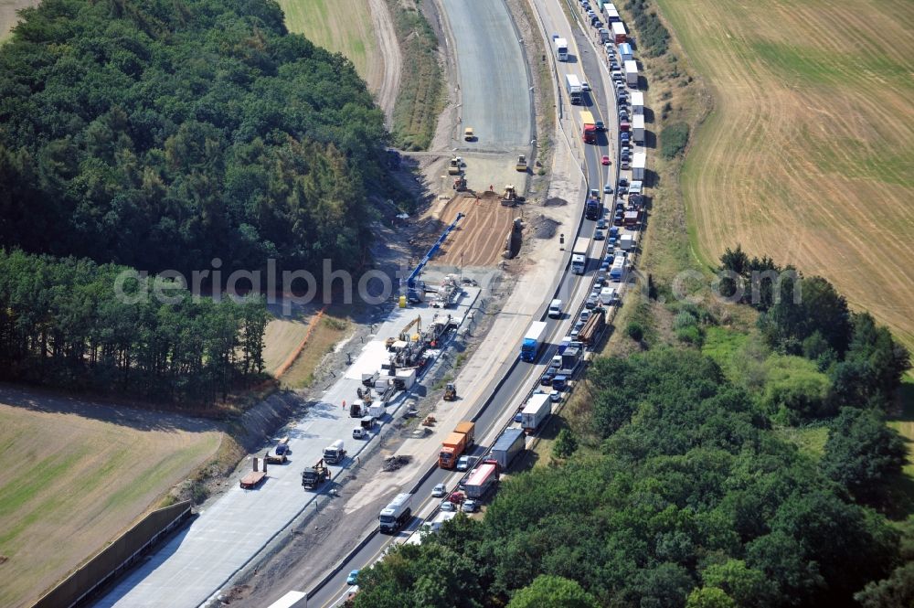 Triptis from above - Buildings and route of the motorway A9 motorway with four lanes now. Currently, reconstruction, expansion and new construction work is underway for the six-lane expansion of Highway 9 between Triptis and Schleiz by Wayss & Freytag Ingenieurbau and EUROVIA VINCI in Thuringia