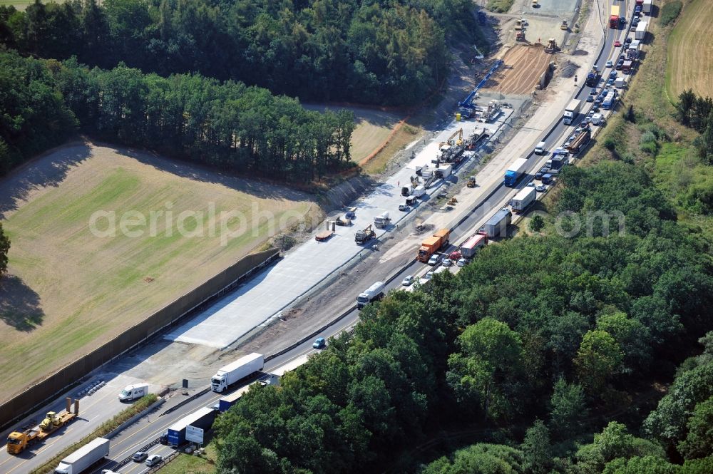 Triptis from the bird's eye view: Buildings and route of the motorway A9 motorway with four lanes now. Currently, reconstruction, expansion and new construction work is underway for the six-lane expansion of Highway 9 between Triptis and Schleiz by Wayss & Freytag Ingenieurbau and EUROVIA VINCI in Thuringia