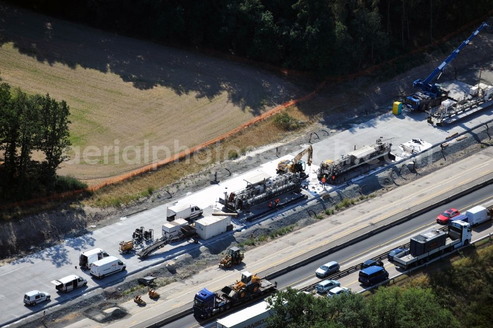 Triptis from above - Buildings and route of the motorway A9 motorway with four lanes now. Currently, reconstruction, expansion and new construction work is underway for the six-lane expansion of Highway 9 between Triptis and Schleiz by Wayss & Freytag Ingenieurbau and EUROVIA VINCI in Thuringia