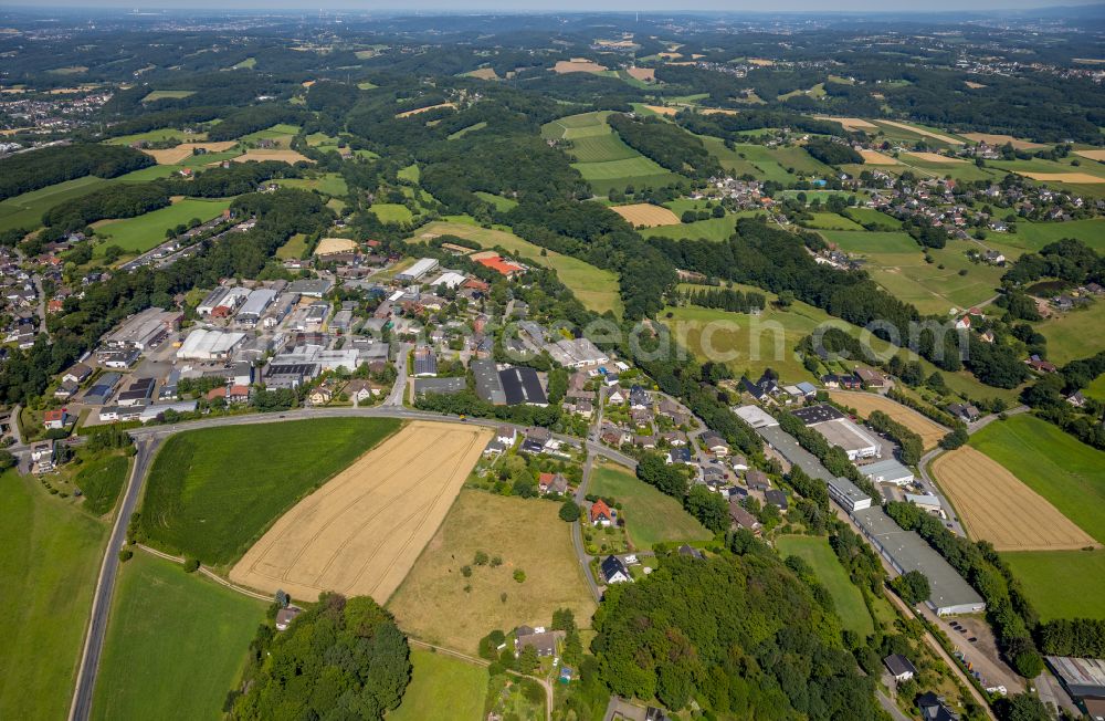 Aerial photograph Bossel - Industrial and commercial area on the edge of agricultural fields and fields in Bossel in the state North Rhine-Westphalia, Germany