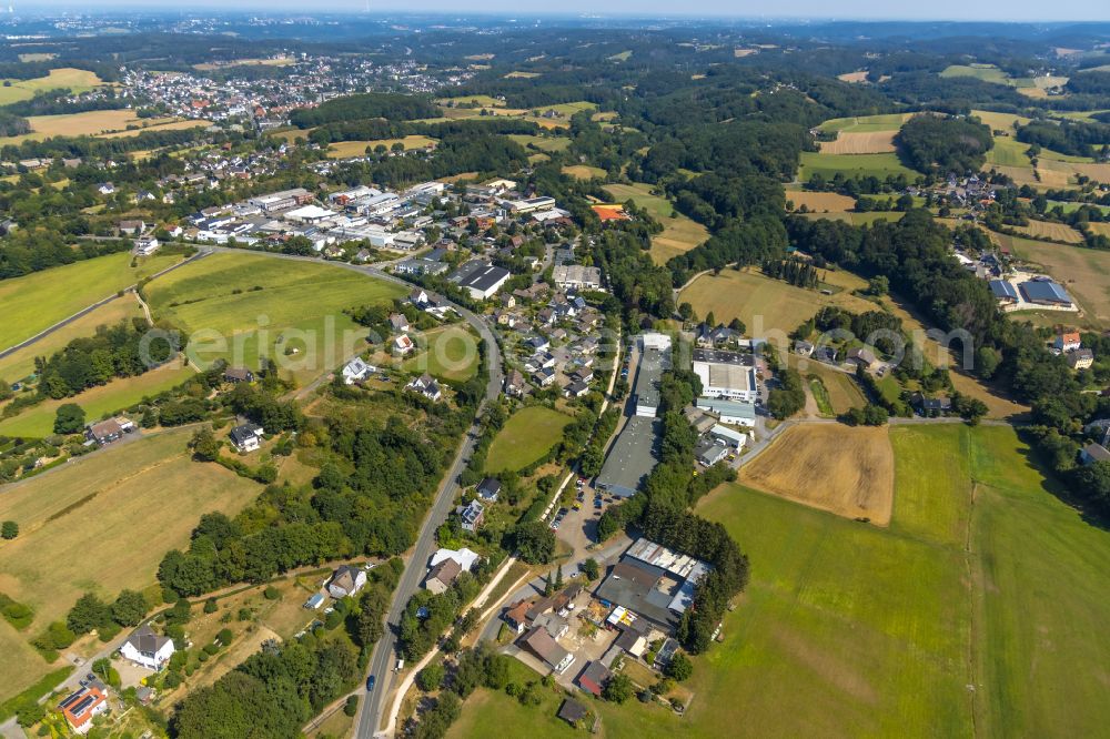 Bossel from the bird's eye view: Industrial and commercial area on the edge of agricultural fields and fields in Bossel in the state North Rhine-Westphalia, Germany