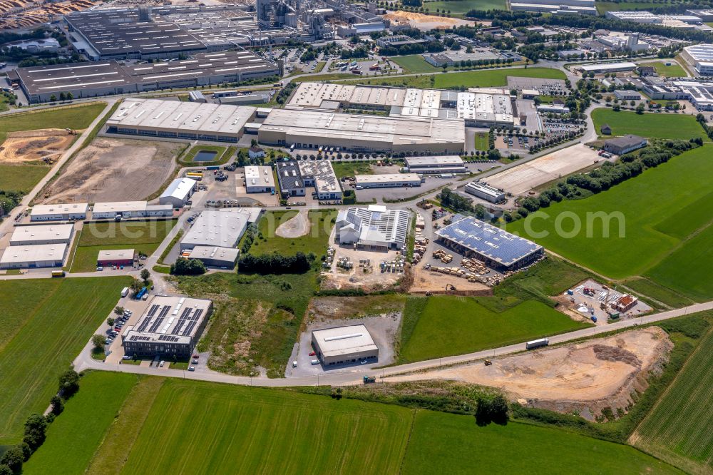 Brilon from the bird's eye view: Industrial and commercial area on the edge of agricultural fields and fields in Brilon at Sauerland in the state North Rhine-Westphalia, Germany