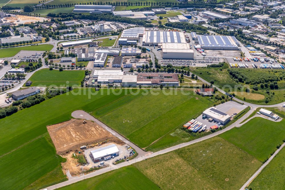 Aerial image Brilon - Industrial and commercial area on the edge of agricultural fields and fields in Brilon at Sauerland in the state North Rhine-Westphalia, Germany