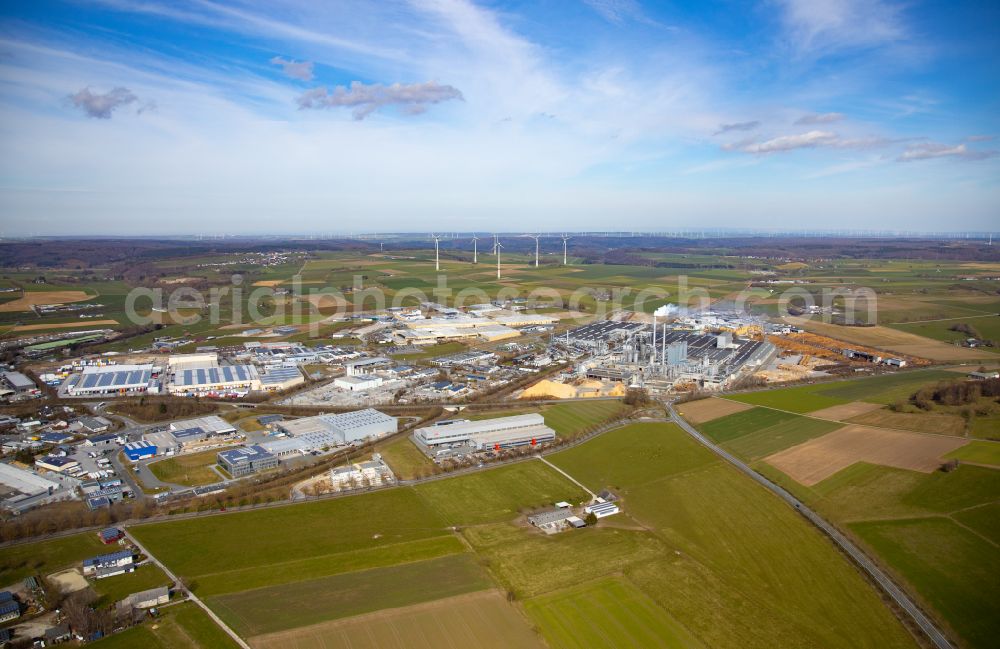 Aerial photograph Brilon - Industrial and commercial area on the edge of agricultural fields and fields in Brilon at Sauerland in the state North Rhine-Westphalia, Germany