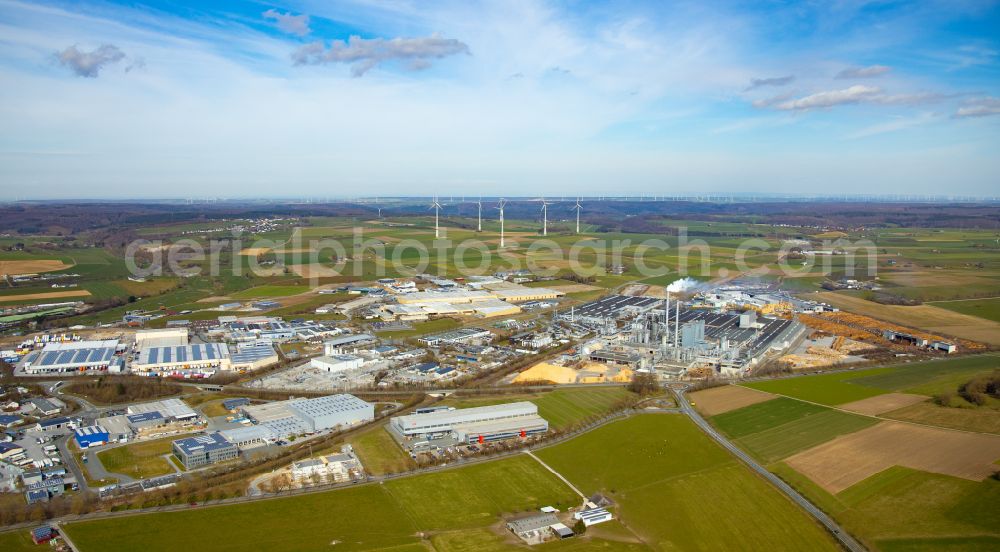 Brilon from above - Industrial and commercial area on the edge of agricultural fields and fields in Brilon at Sauerland in the state North Rhine-Westphalia, Germany