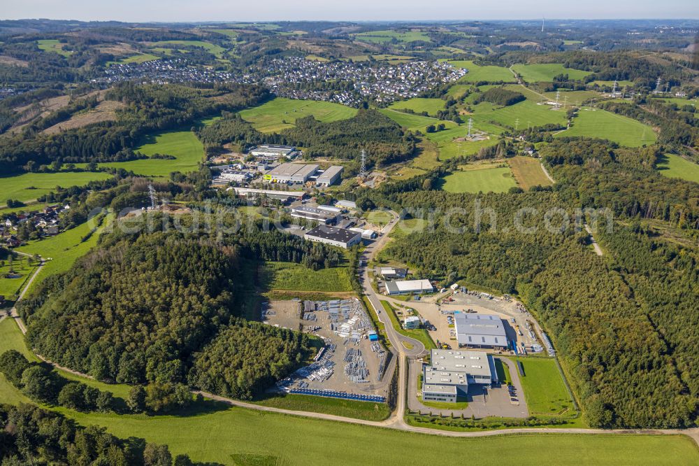 Aerial photograph Herscheid - Industrial and commercial area on the edge of agricultural fields and fields on street Friedliner Strasse in Herscheid in the state North Rhine-Westphalia, Germany
