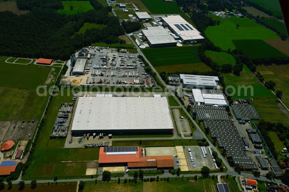 Meitze from the bird's eye view: Industrial and commercial area on the edge of agricultural fields and fields on street Bremer Weg in Meitze in the state Lower Saxony, Germany