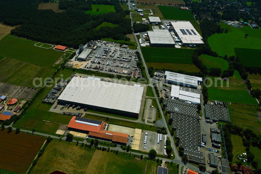 Aerial image Meitze - Industrial and commercial area on the edge of agricultural fields and fields on street Bremer Weg in Meitze in the state Lower Saxony, Germany