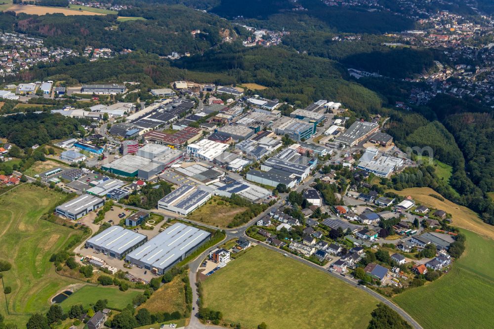 Aerial image Oelkinghausen - Industrial and commercial area on the edge of agricultural fields and fields in Oelkinghausen in the state North Rhine-Westphalia, Germany