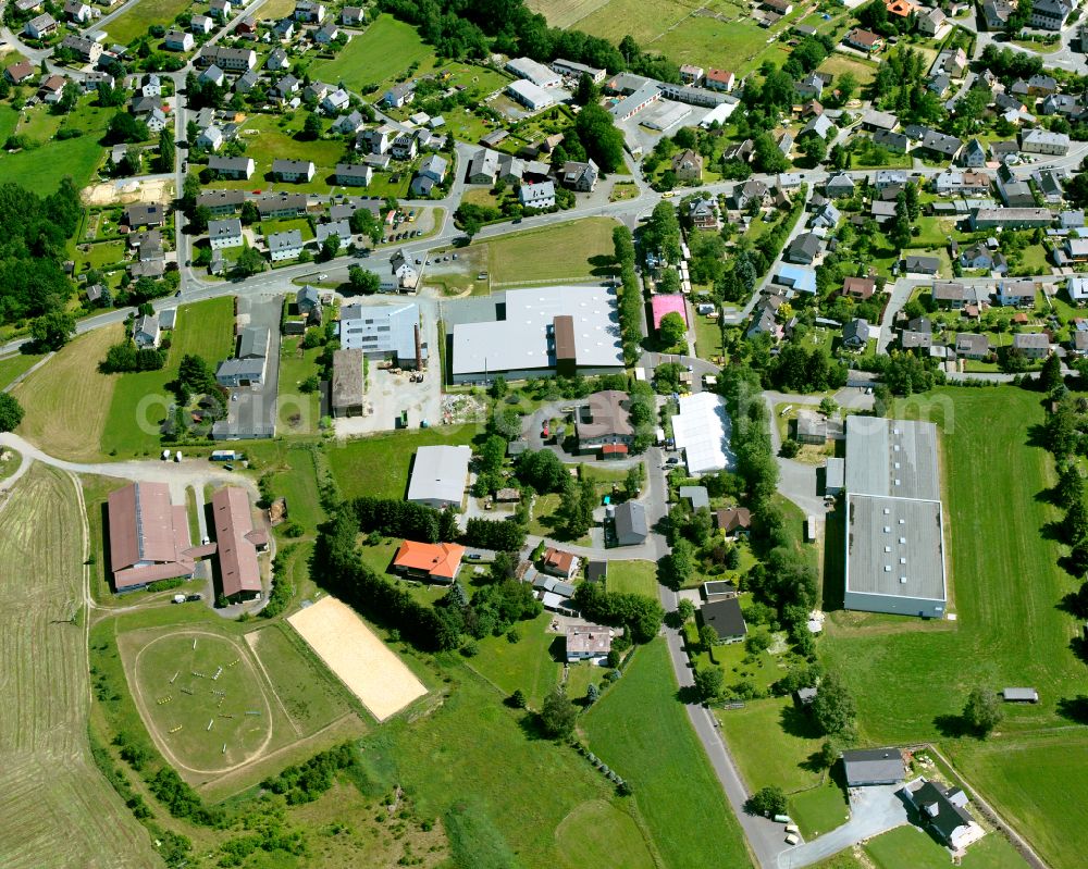 Sparneck from the bird's eye view: Industrial and commercial area on the edge of agricultural fields and fields in Sparneck in the state Bavaria, Germany