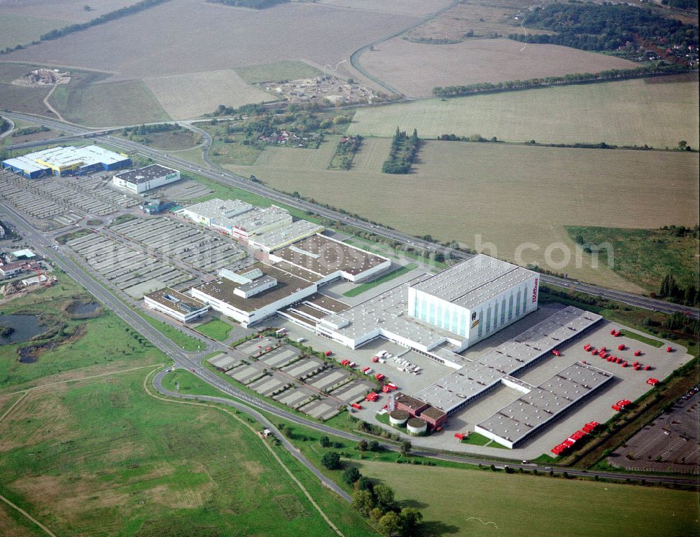 Waltersdorf from above - Industrial and commercial area on the edge of agricultural fields and fields on street Am Rondell in Waltersdorf in the state Brandenburg, Germany