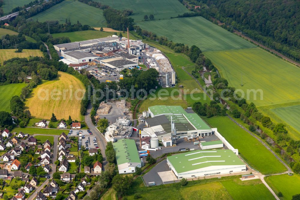 Aerial image Wrexen - Industrial and commercial area on the edge of agricultural fields and fields in Wrexen in the state Hesse, Germany