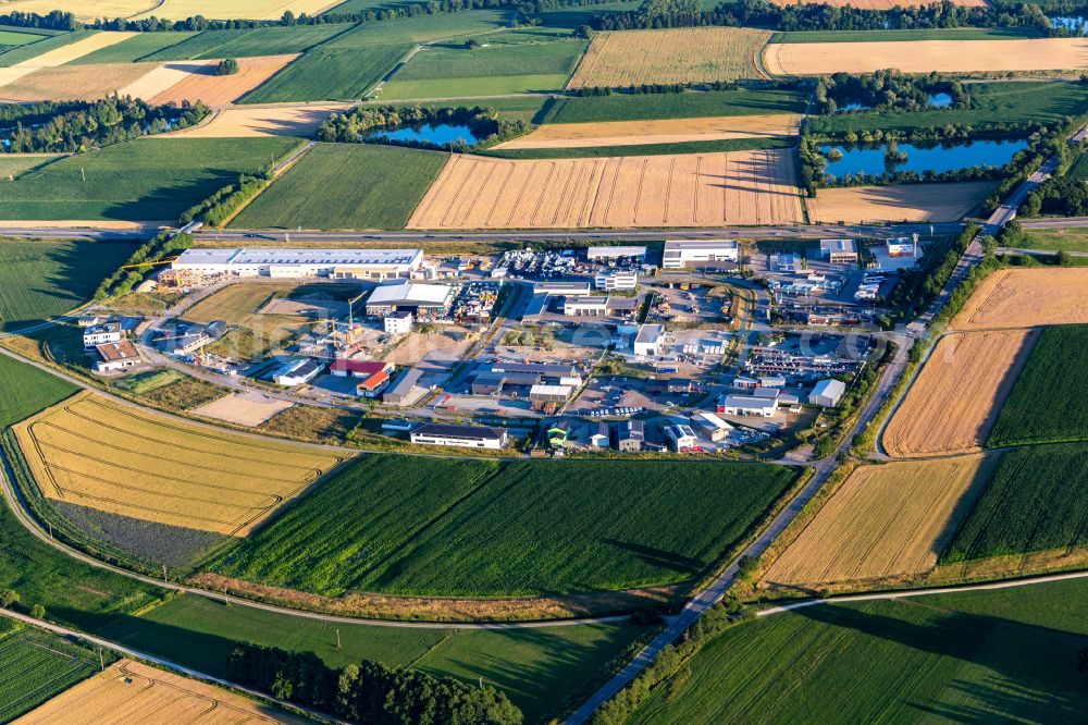 Aerial image Wörth an der Donau - Industrial and commercial area on the edge of agricultural fields and fields on street Im Gewerbepark in Woerth an der Donau in the state Bavaria, Germany