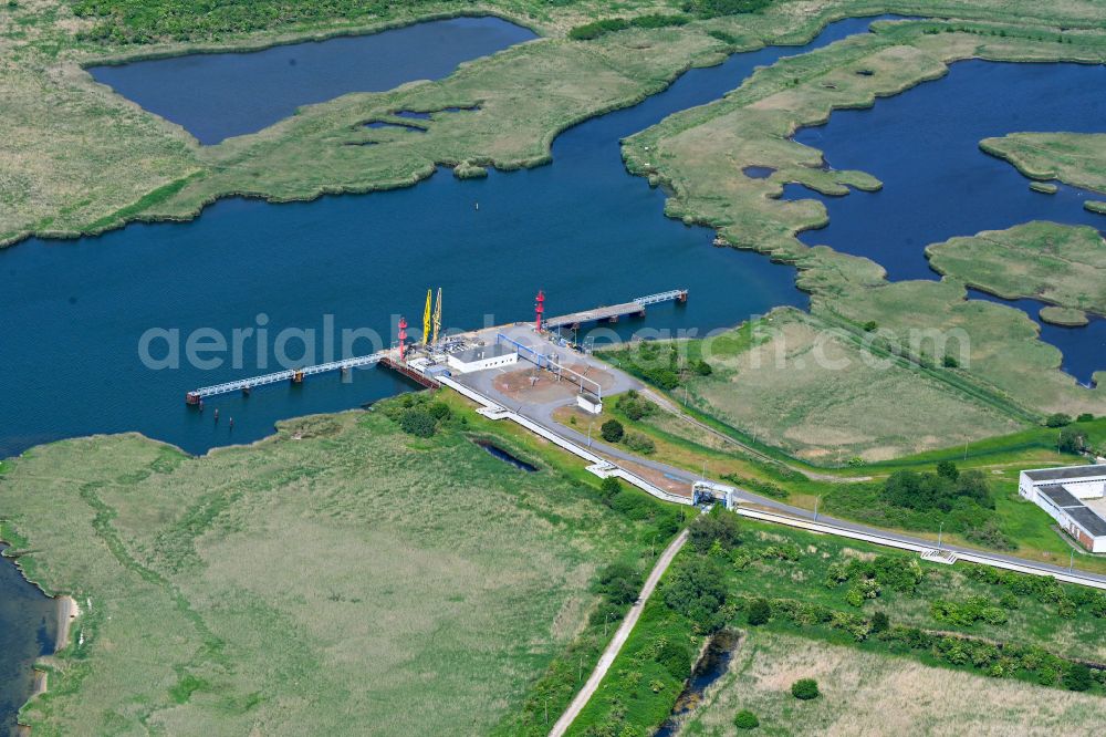 Rostock from the bird's eye view: Water bridge with line systems of the LNG natural gas and liquid gas terminal and unloading quay in the district Peez in Rostock at the baltic sea coast in the state Mecklenburg - Western Pomerania, Germany