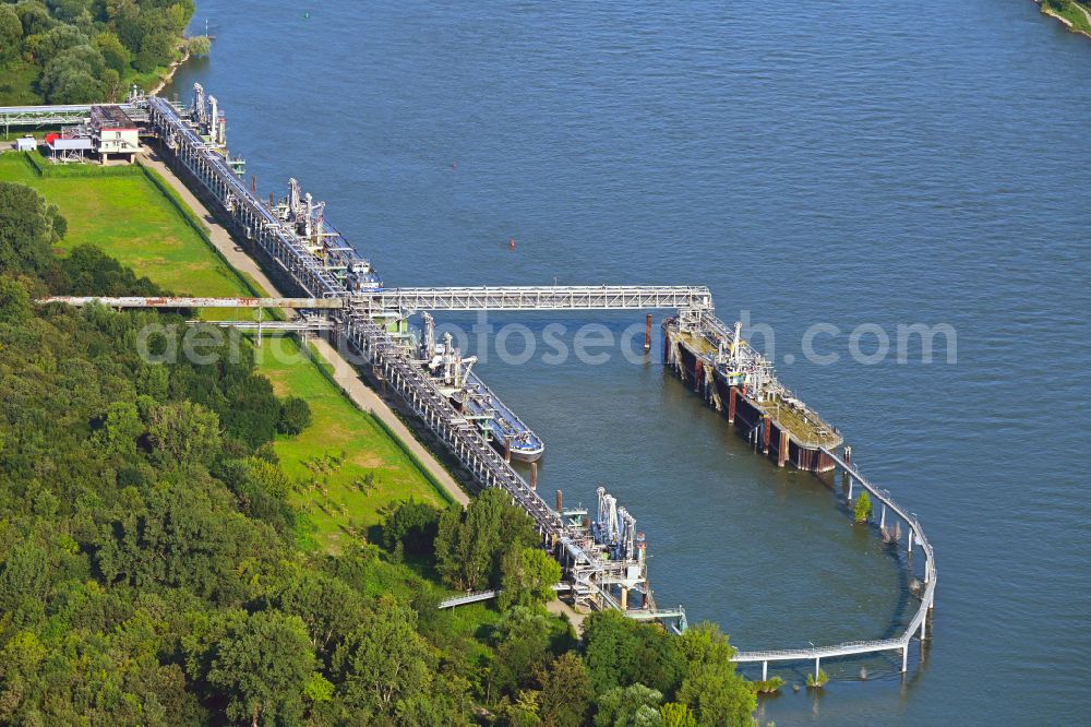 Niederkassel from the bird's eye view: Water bridge with pipeline systems of the LNG natural gas and liquefied petroleum gas terminal and unloading quay of Luelsdorf Functional Solutions GmbH on the banks of the Rhine in Niederkassel in the state of North Rhine-Westphalia, Germany