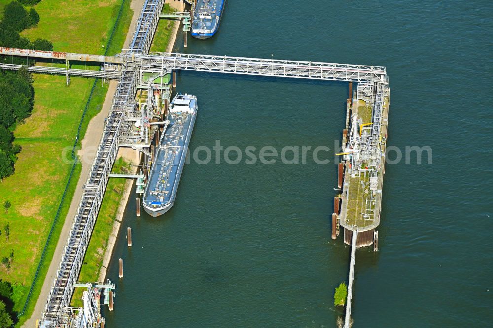 Niederkassel from above - Water bridge with pipeline systems of the LNG natural gas and liquefied petroleum gas terminal and unloading quay of Luelsdorf Functional Solutions GmbH on the banks of the Rhine in Niederkassel in the state of North Rhine-Westphalia, Germany