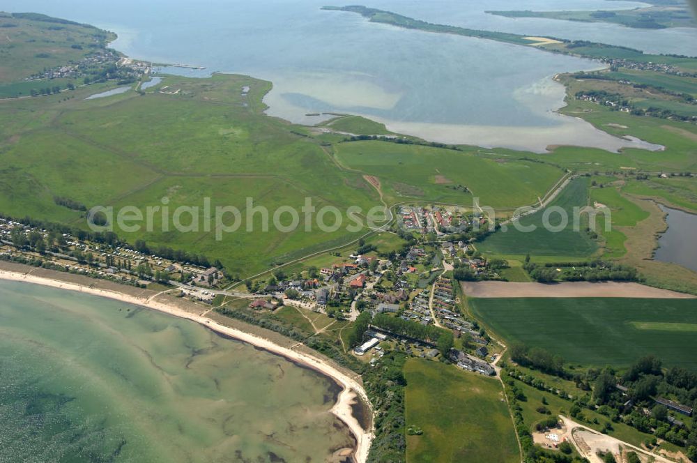 Aerial image Lobbe - Blick über die Stadt Lobbe an der Ostsee auf Felder im Biosphärenreservat Südost Rügen und den Rügischen Bodden - Mecklenburg-Vorpommern MV. View over the town Lobbe on the Baltic Sea onto fields of the biospheres reserve / preserve southeast Ruegen und the Rügischer Bodden - Mecklenburg-Western Pomerania.