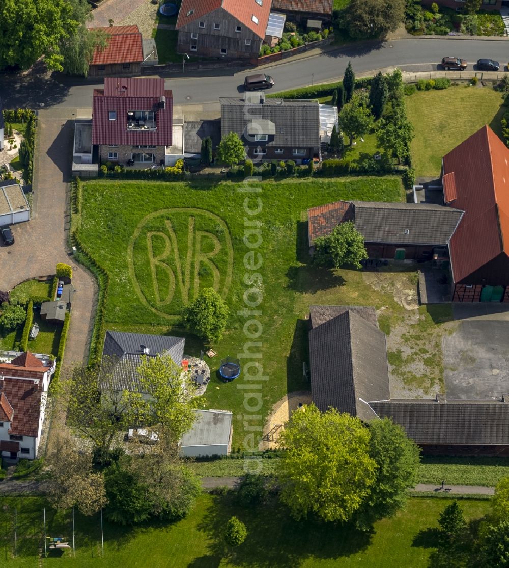 Aerial image Herne - Logo of the football team BVB 09 on a lawn in a residential district in the state North Rhine-Westphalia