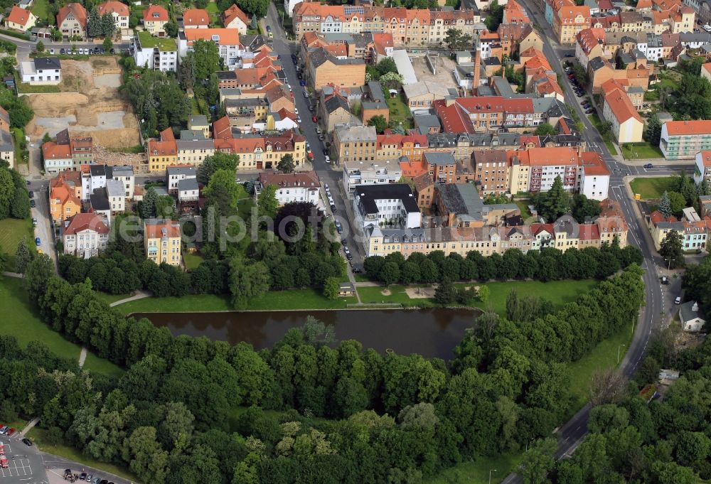 Aerial image Apolda - The Lohteich is a part of the leisure facilities in the south of the city Apolda in Thuringia. The angling is located on the residential area Muellerstrasse - Alexan der road. The wide-Adolf-Aber-Strasse is a major access road into the city center