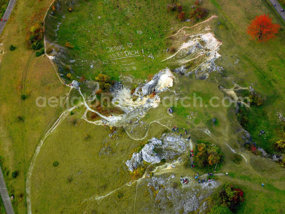 Aerial photograph Göppingen - The slogan Jesus loves you in the crater of the former quarry near Göppingen in Baden-Wuerttemberg